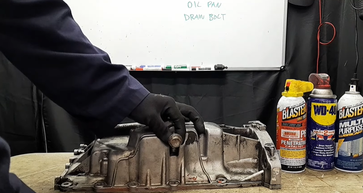  Take off a Stripped Oil Pan Bolt