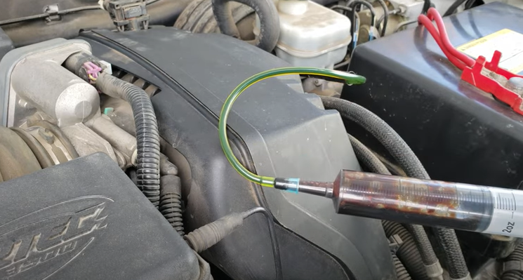 how to drain oil from a car