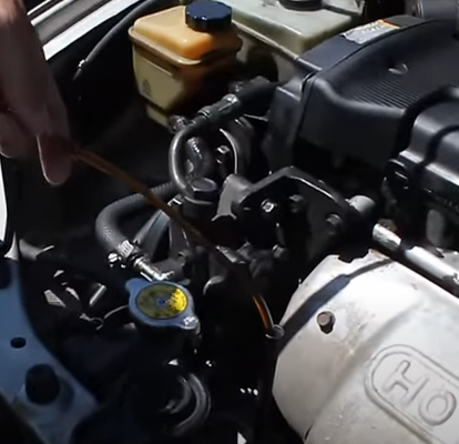 How to Siphon Oil Out of a Car