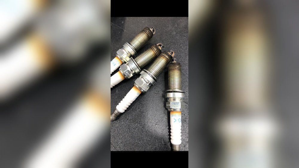 How Long to Let Engine Cool before Changing Spark Plugs: Essential Tips