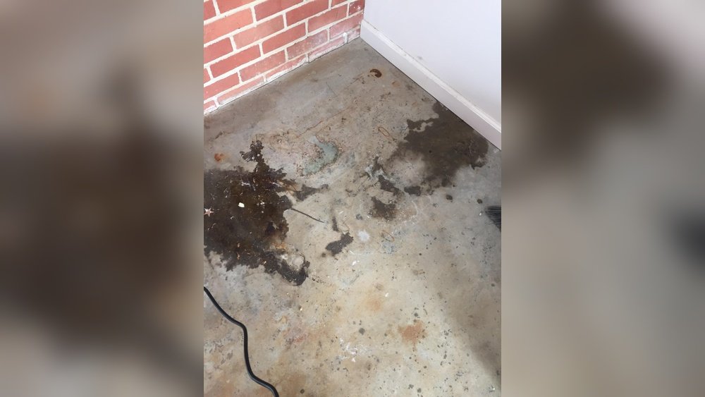 How to Remove Old Oil Stains from Concrete Garage Floor: Easy & Effective Methods
